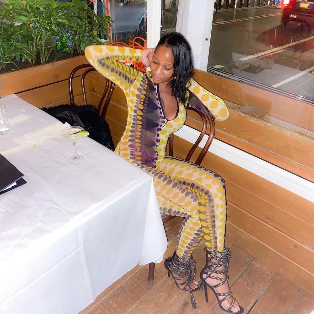 Sheer jumpsuit size small
